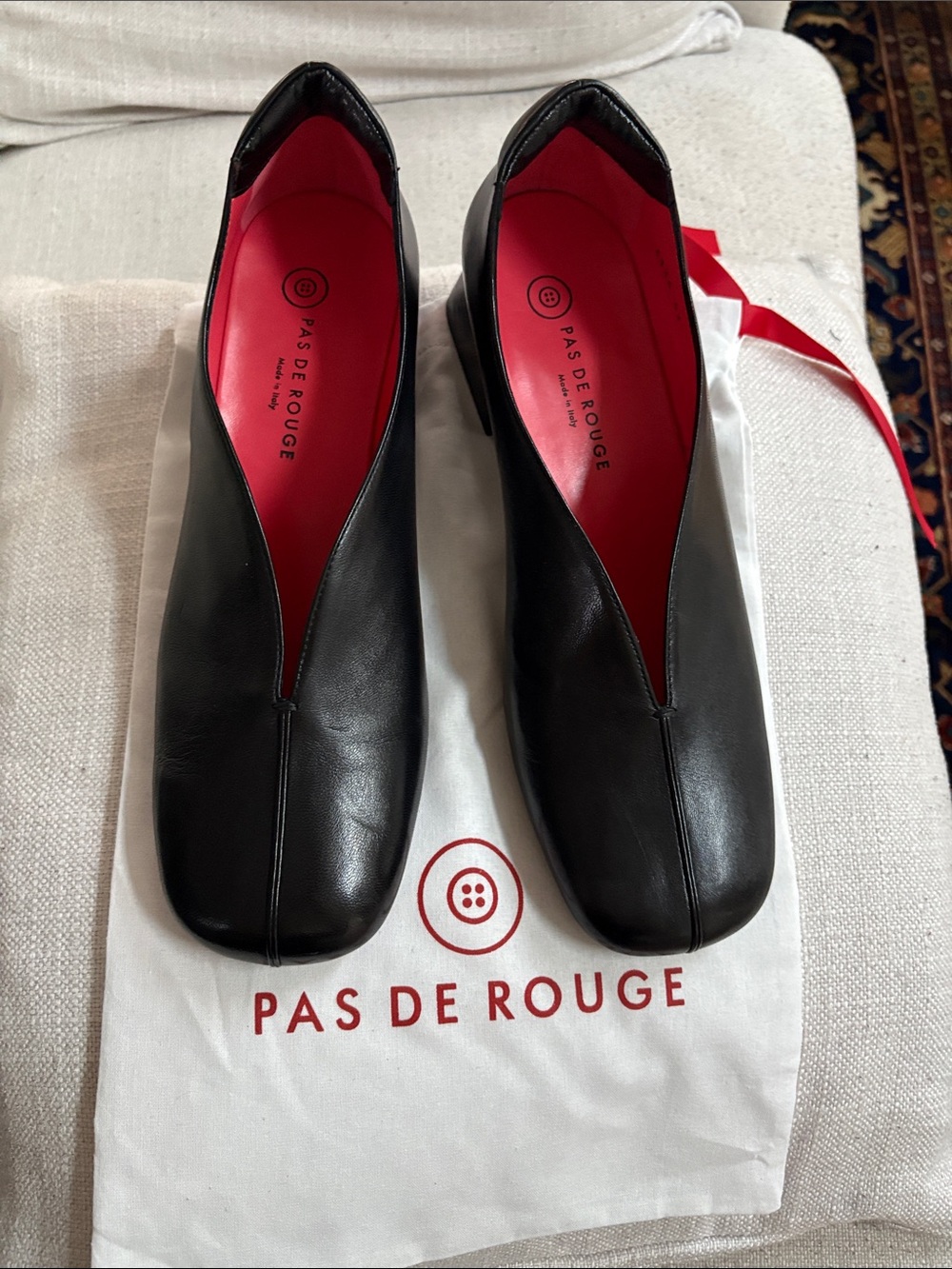 Pas de Rouge Black Leather Slip-On Flats with Red Insoles